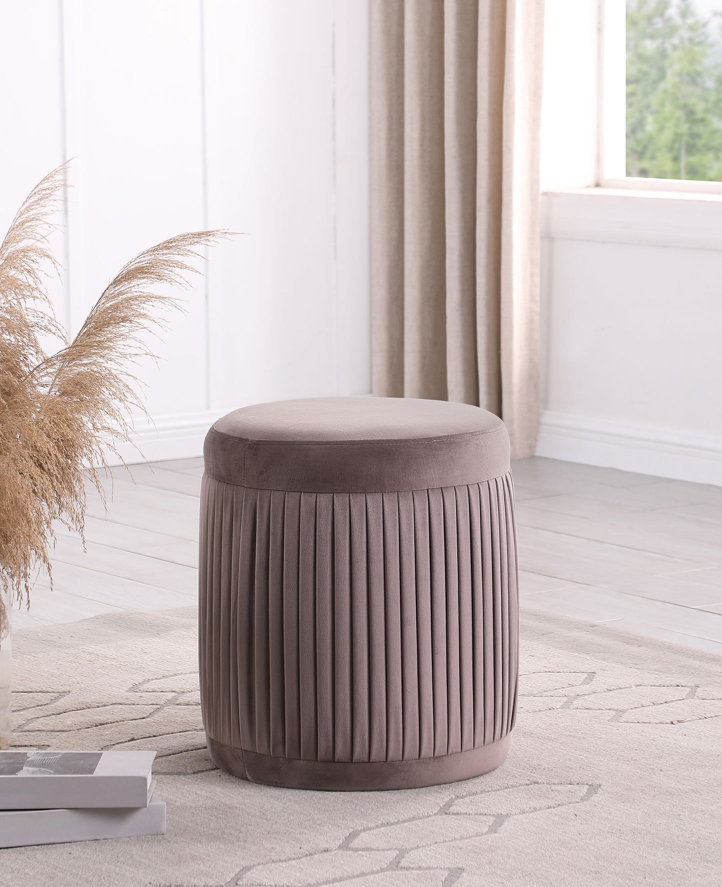 Tovar Round Upholstered Ottoman Mauve